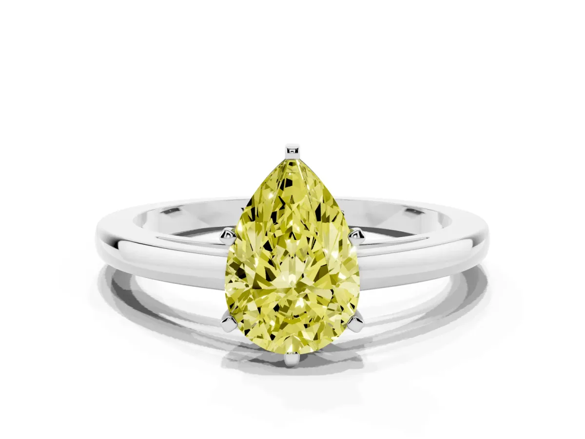 Fancy Yellow Pear Cut Solitaire Diamond Engagement Ring with Four-Prong Setting on a Classic Band White gold
