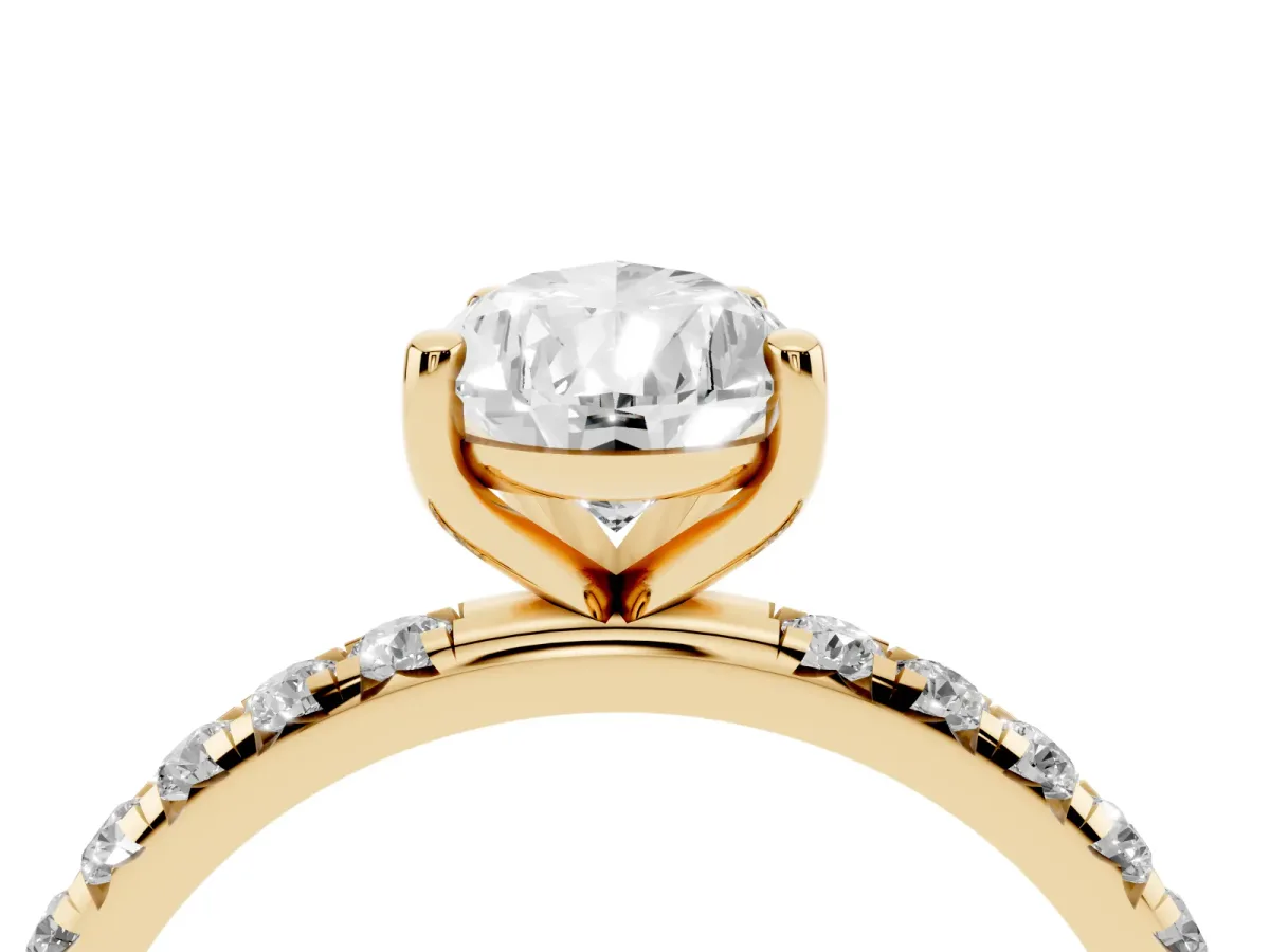 Pear Cut Cut Diamond Solitaire Ring with Micro Pave Band and Four Prong Setting Yellow gold