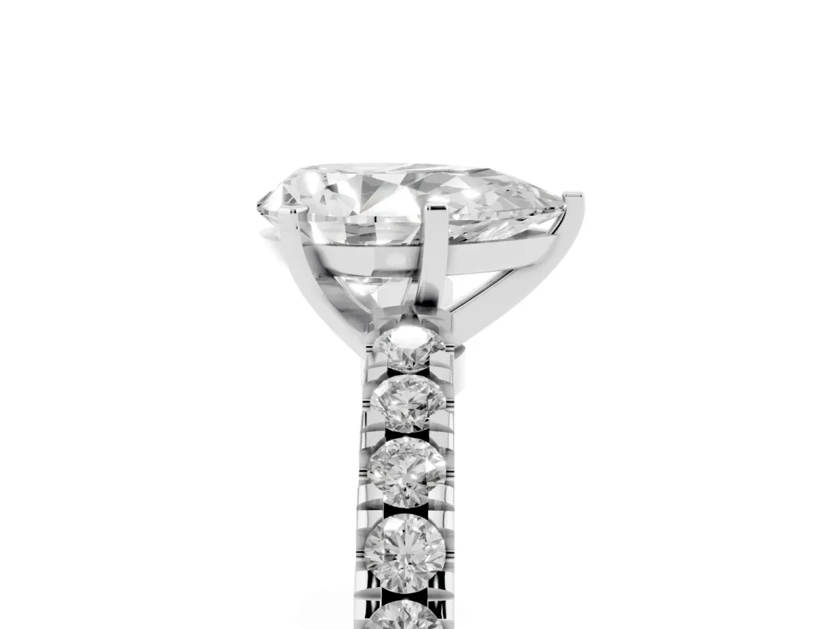 Pear Cut Solitaire Diamond with Pavé Band and Four-Prong Setting Silver