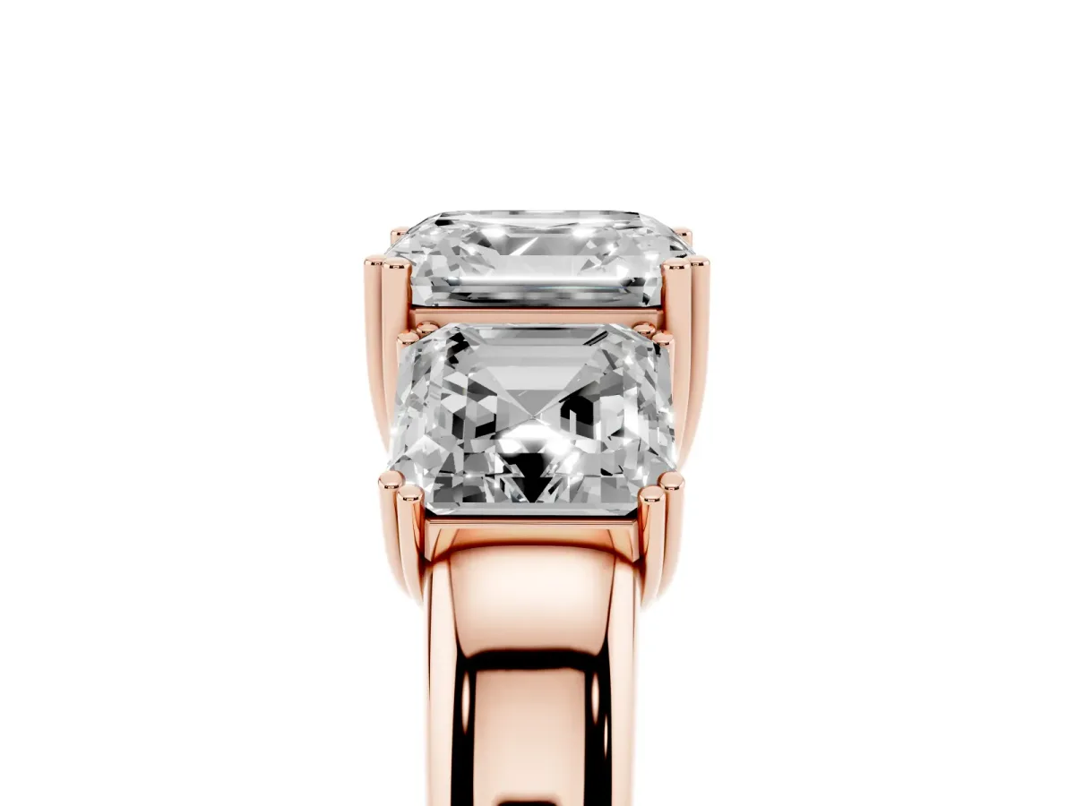 Three-Stone Asscher Cut Cut Diamond Ring with Channel Set Band and Four-Prong Setting Rose gold