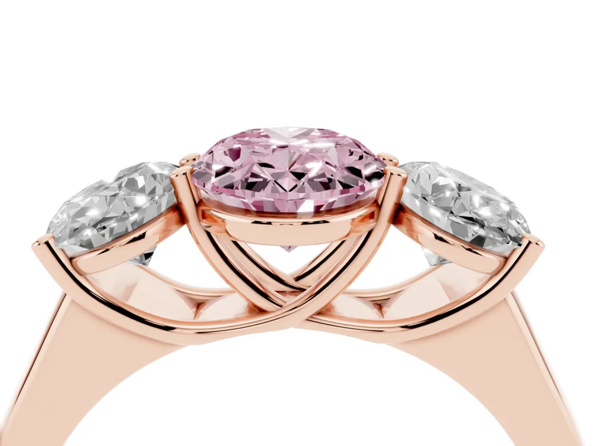 Fancy Pink Oval Cut Three-Stone Diamond Ring with Prong Setting on a Classic Band Rose gold
