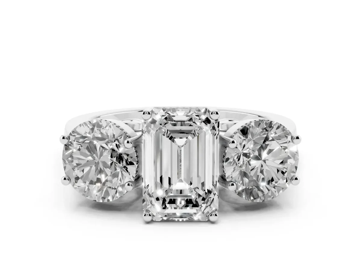 Three-Stone Emerald Cut Diamond Engagement Ring with Prong Setting on a Classic Band Platinum