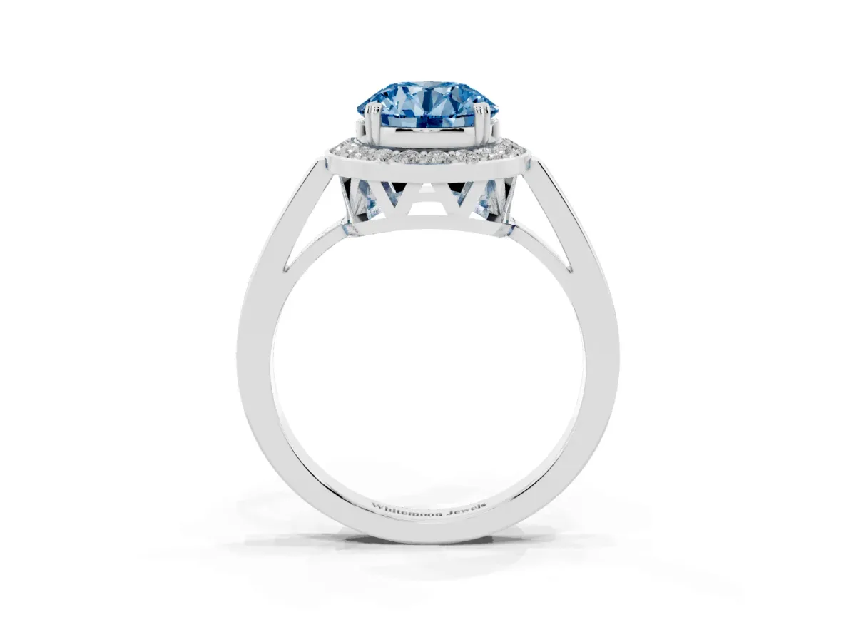 Fancy Blue Round Cut Diamond Halo Ring with Split Shank and Four-Prong Setting White gold