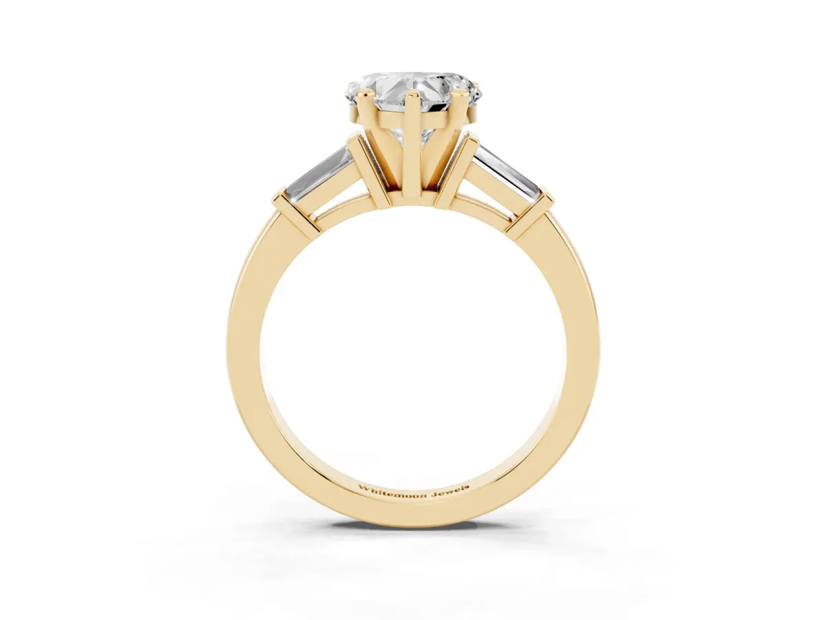 Heart Cut Cut Diamond Solitaire Ring with Tapered Baguette Accents and Four-Prong Setting Yellow gold