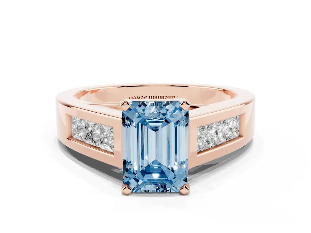 Fancy Blue Emerald Cut Cut Channel Set Solitaire Ring with Four-Prong Setting Rose gold