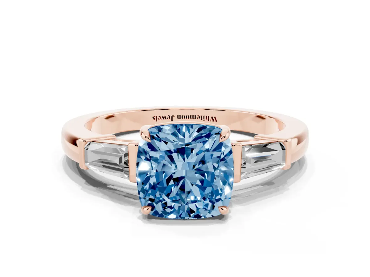 Fancy Blue Cushion Cut Diamond Three-Stone Ring with Tapered Baguette Side Stones and Prong Setting Rose gold