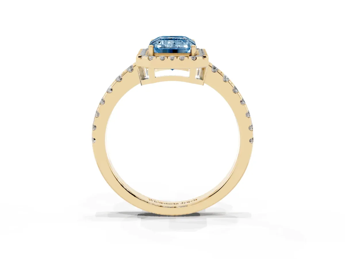 Fancy Blue Emerald Cut Diamond Halo Ring with Pavé Band and Four-Prong Setting Yellow gold