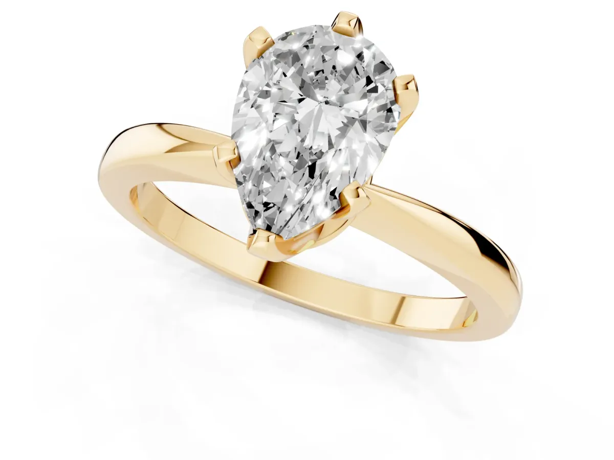 Pear Cut Solitaire Engagement Ring with Six-Prong Setting and Tapered Band Yellow gold