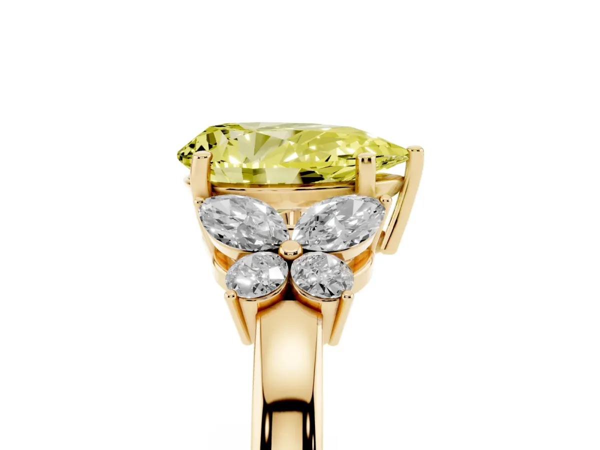 Fancy Yellow Pear Cut Cut Solitaire Floral Diamond Ring with Four-Prong Setting Yellow gold