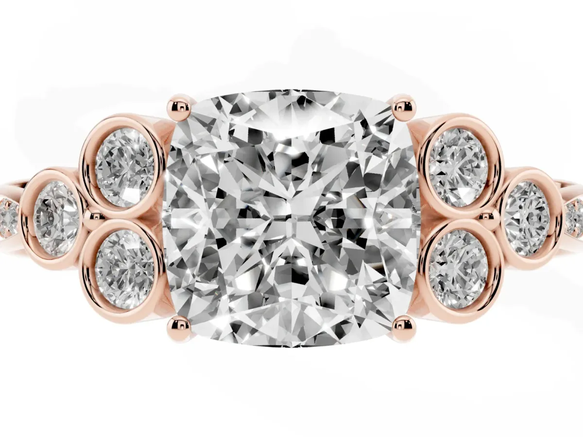 Cushion Cut Cut Diamond Engagement Ring with Bezel Set Round Side Stones and Prong Setting Rose gold