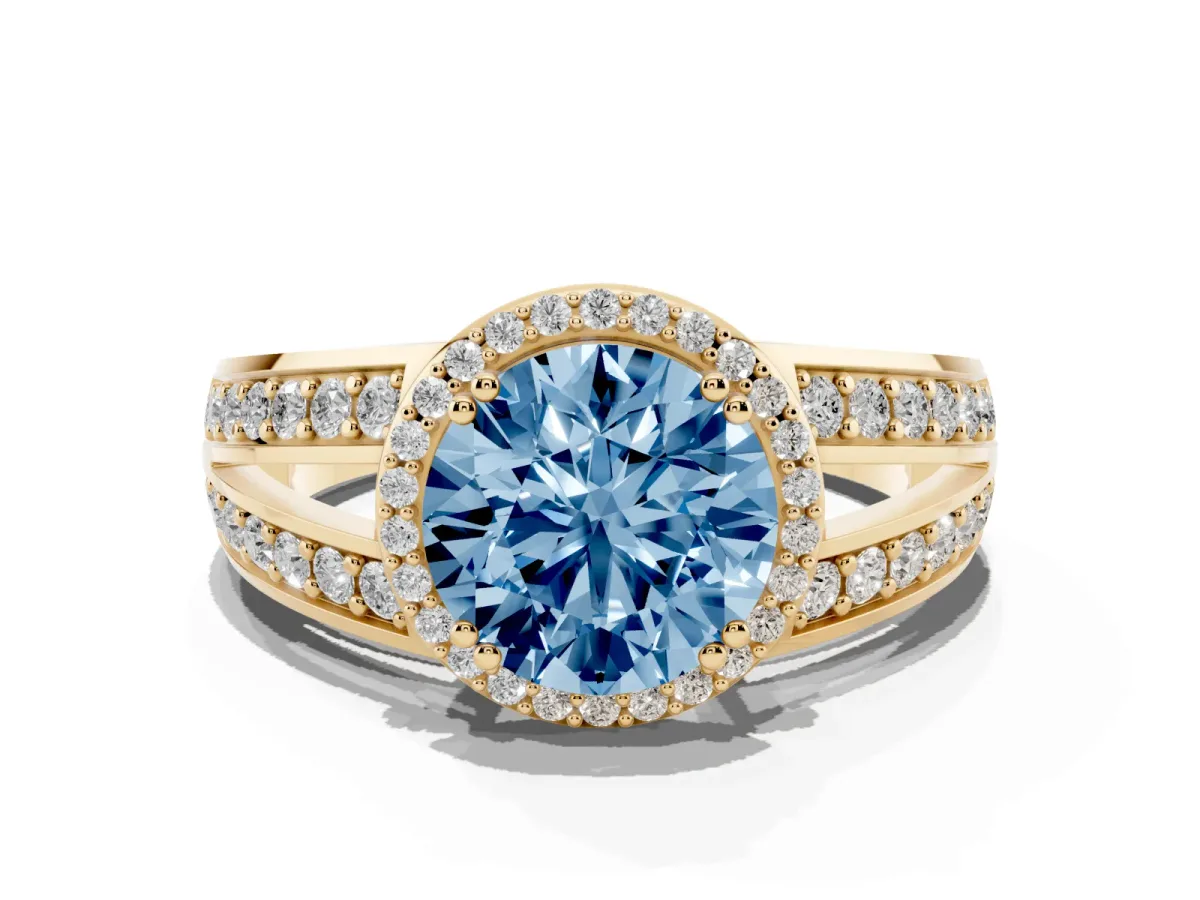 Fancy Blue Round Cut Diamond Halo Ring with Split Shank Pavé Band and Four-Prong Setting Yellow gold