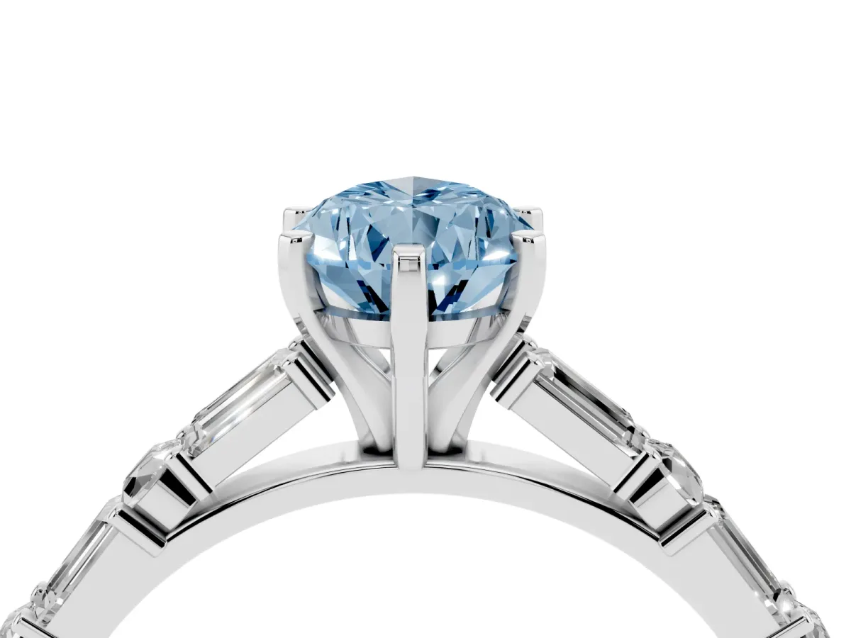 Fancy Blue Pear Cut Diamond Solitaire with Side Baguettes and Channel Set Band Silver