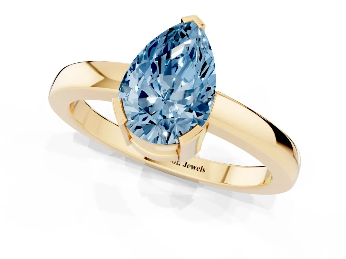 Fancy Blue Pear Cut Cut Solitaire Ring with Four-Prong Setting and Classic Band Yellow gold