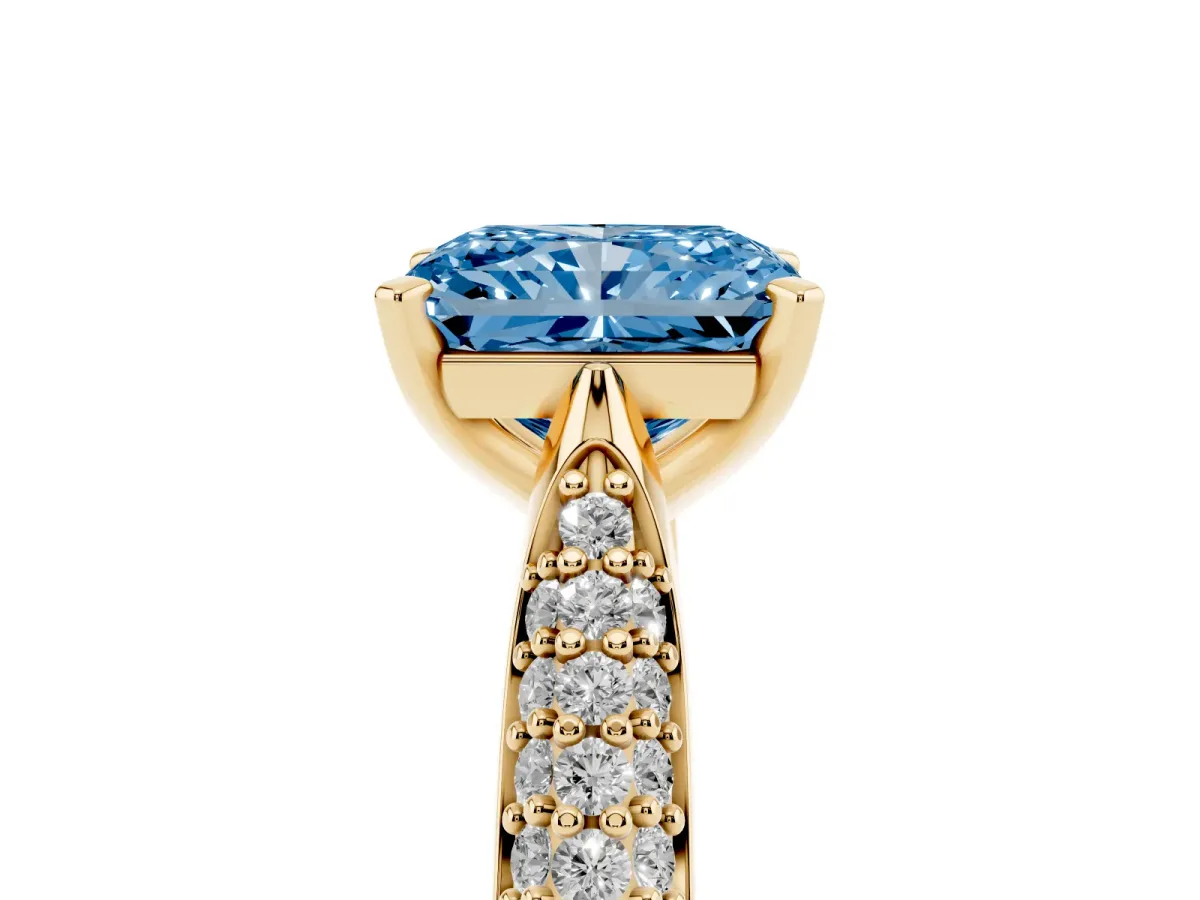 Fancy Blue Radiant Cut Diamond Solitaire Engagement Ring with Multi-Row Round Pavé Band and Prong Setting Yellow gold
