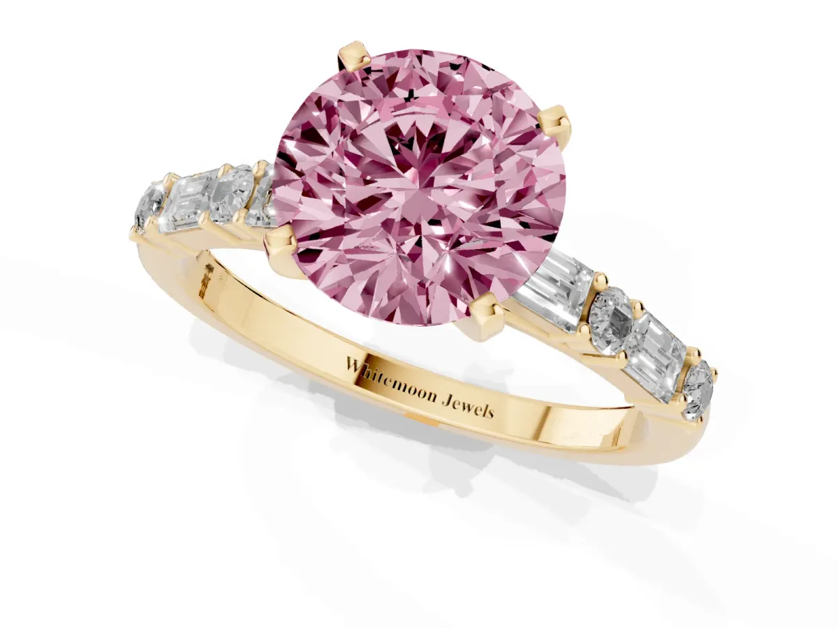 Fancy Pink Round Cut Diamond Solitaire with Side Baguettes and Channel Set Band Yellow gold