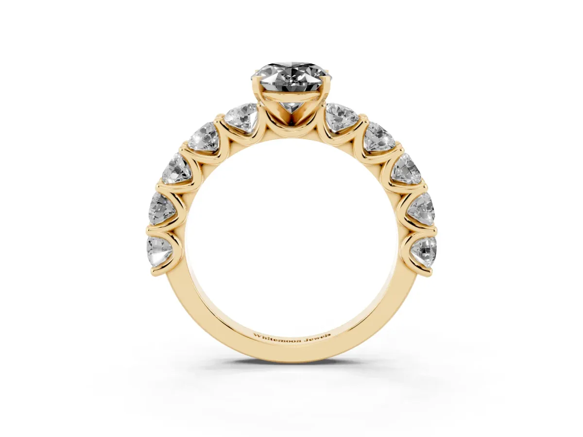 Fancy Black Oval Cut Diamond Prong Setting with Side Stones on a Pave Band Yellow gold