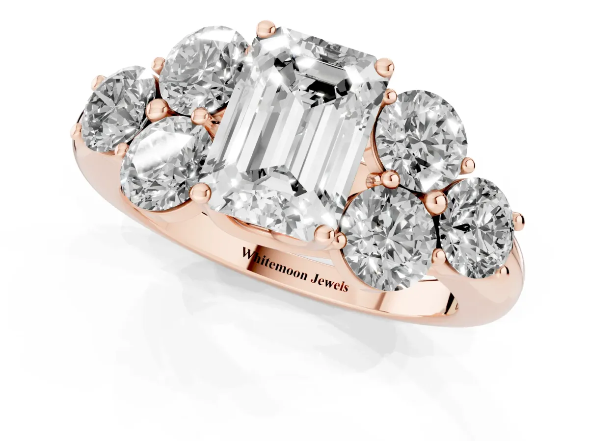 Emerald Cut Cut Diamond Cluster Ring with Round Accent Stones and Prong Setting on a Classic Band Rose gold