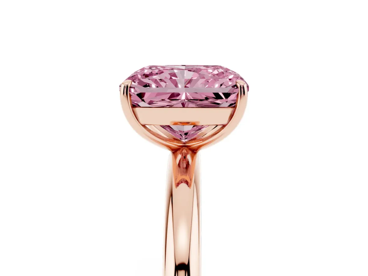 Fancy Pink Radiant Cut Solitaire Diamond Ring with Four-Prong Setting on a Plain Band Rose gold