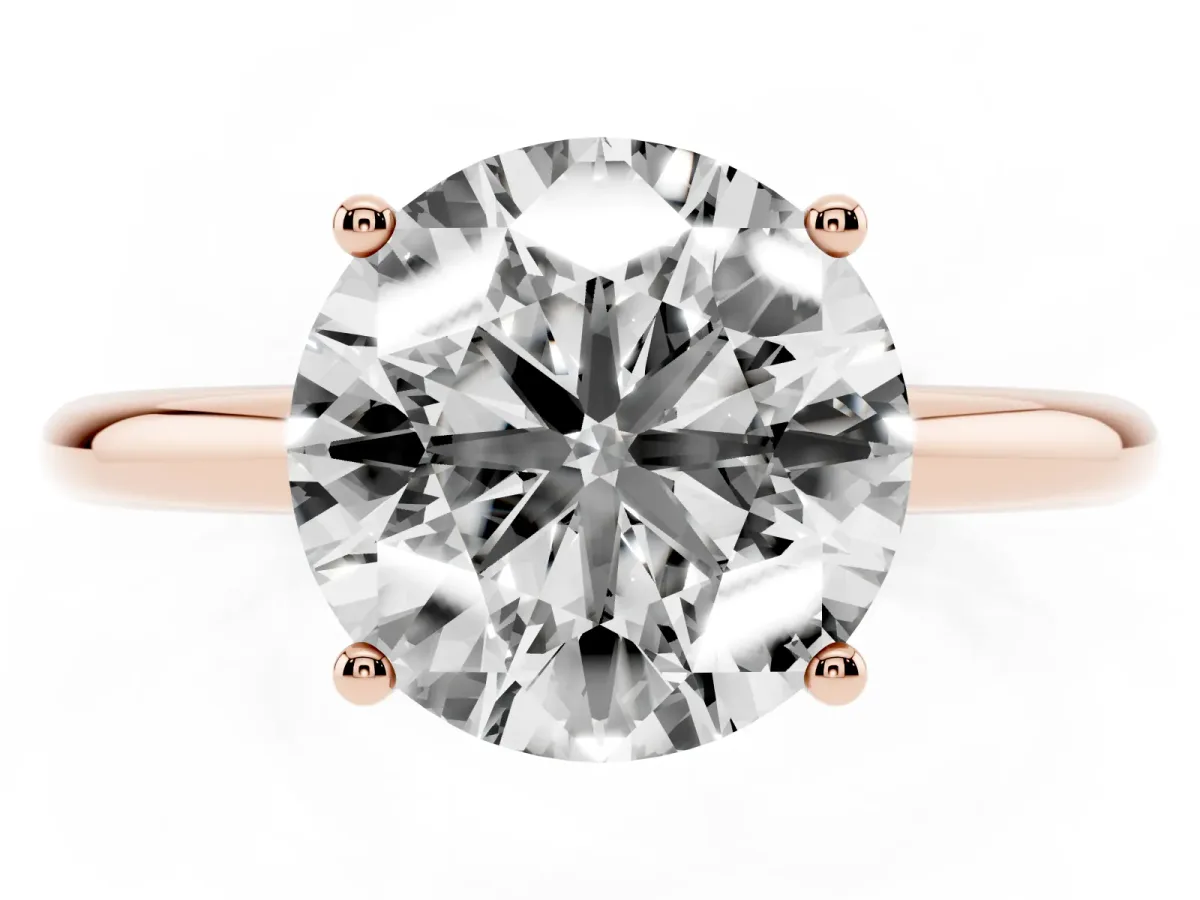 Round Cut Cut Solitaire Engagement Ring with Four-Prong Setting and Classic Band Rose gold