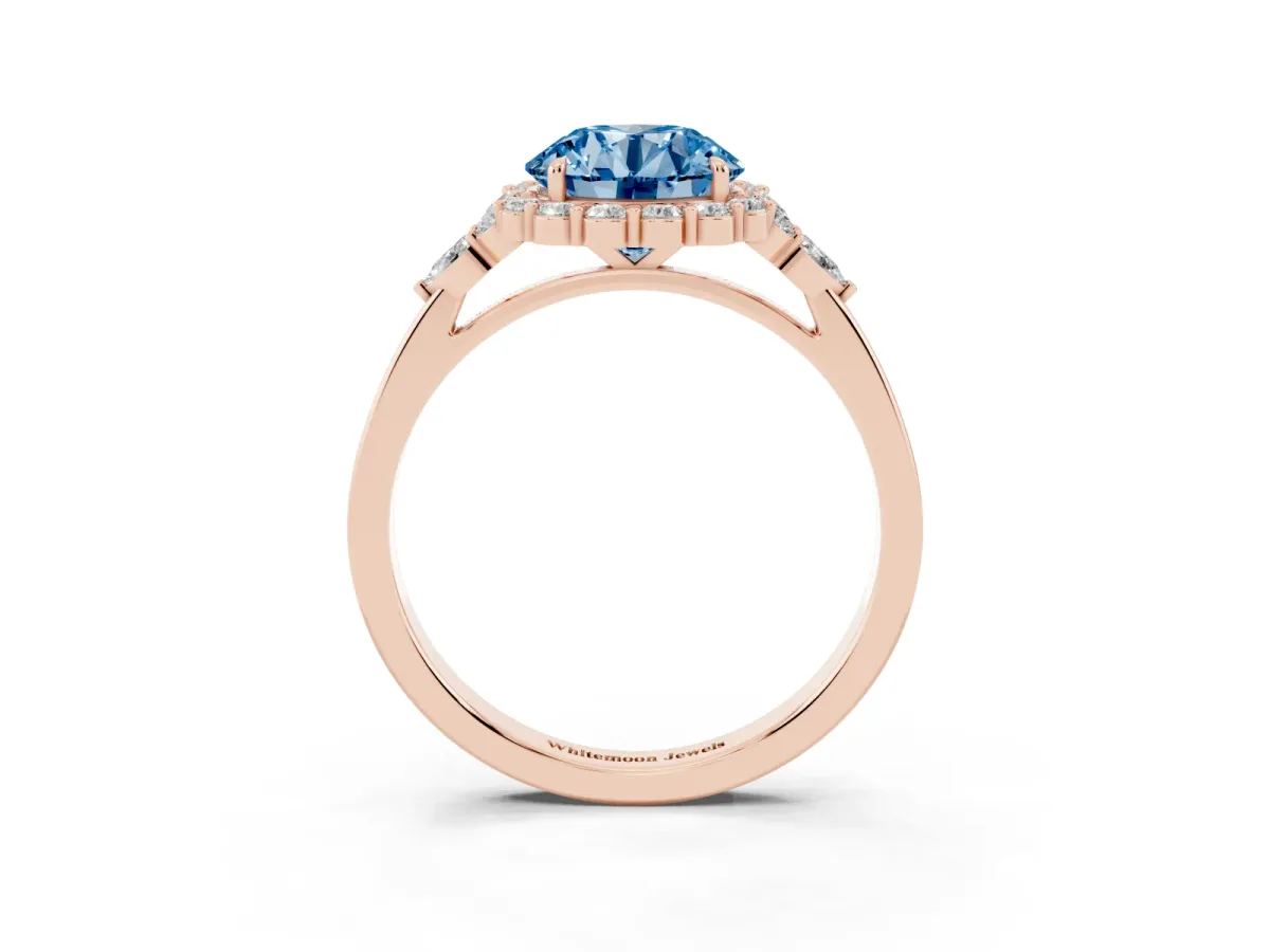 Fancy Blue Round Cut Diamond Halo Ring with Pear Side Stones and Prong Setting Rose gold