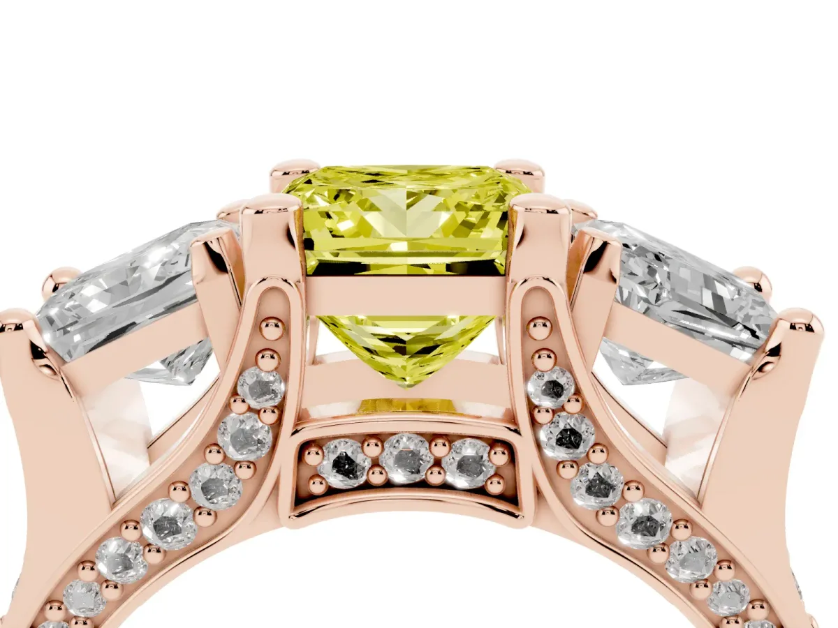 Fancy Yellow Princess Cut Diamond Three-Stone Ring with Channel Set Band and Four-Prong Setting Rose gold