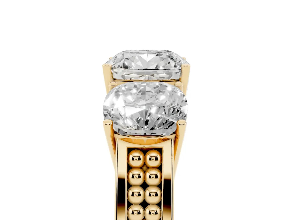 Cushion Cut Diamond Three-Stone Ring with Prong Setting and Textured Band Yellow gold