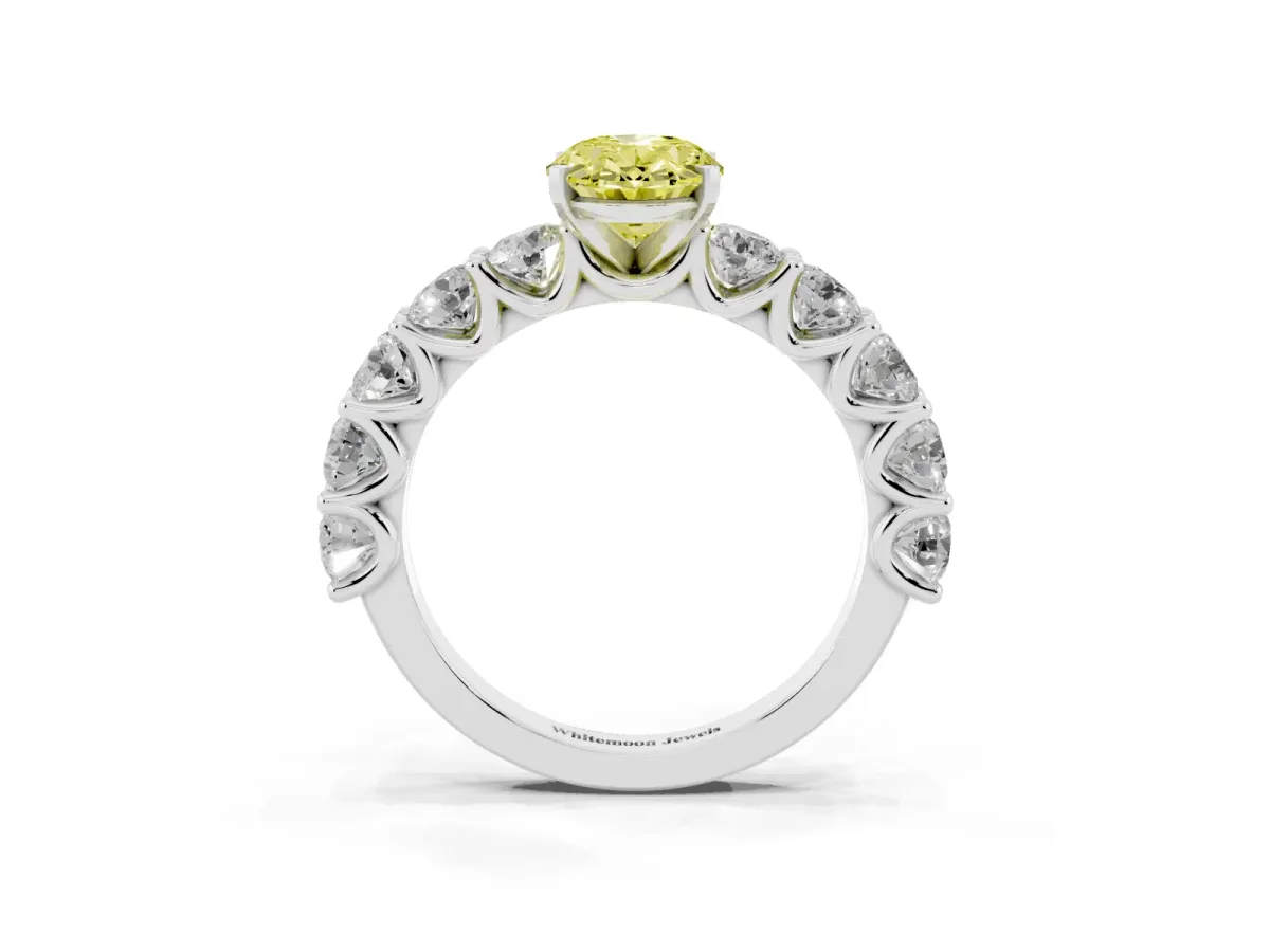 Fancy Yellow Oval Cut Diamond Prong Setting with Side Stones on a Pave Band Silver