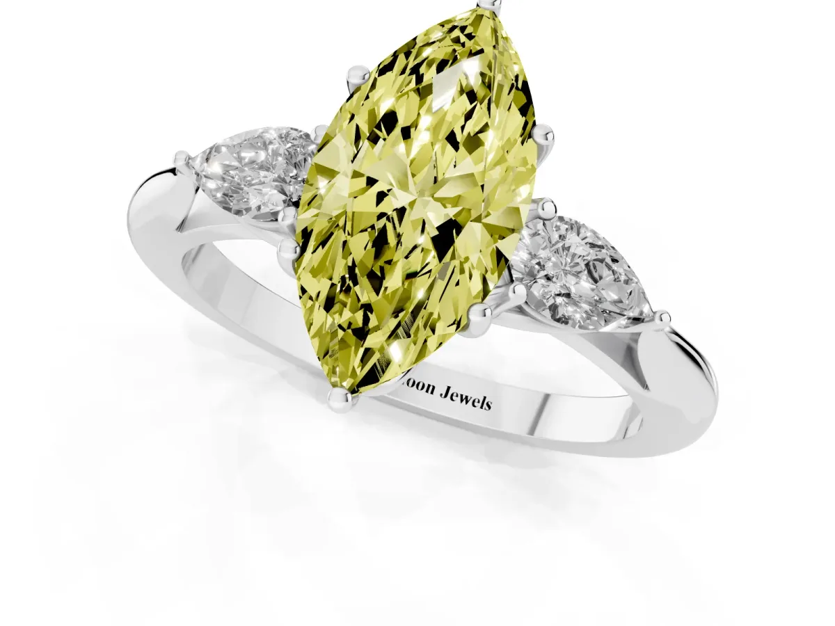 Fancy Yellow Three-Stone Marquise Cut Brilliant Diamond Solitaire Ring with Tapered Band and Four-Prong Setting White gold