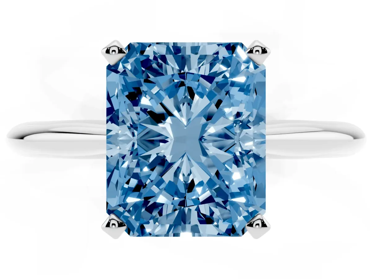 Fancy Blue Radiant Cut Cut Solitaire Ring with Four-Prong Setting on a Classic Band Silver