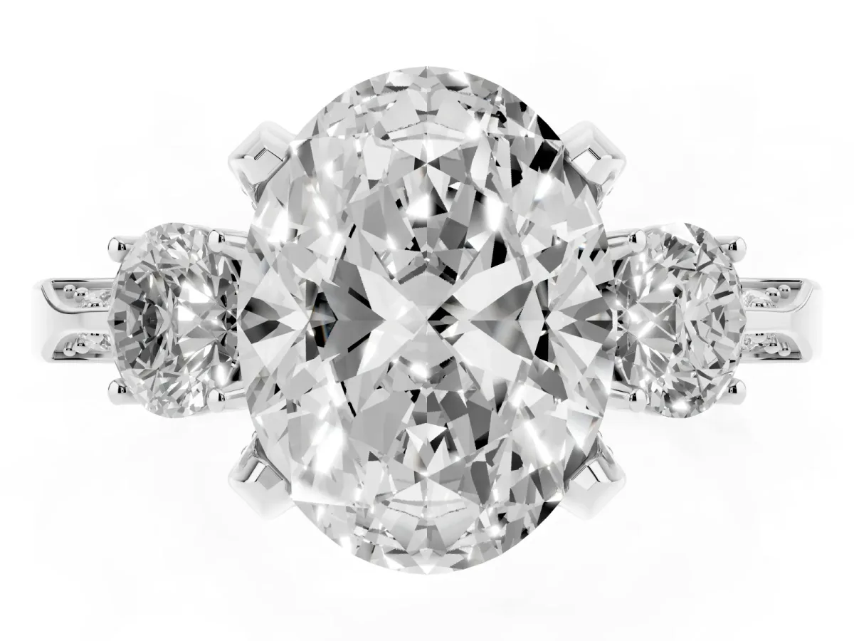 Oval Cut Brilliant Three-Stone Diamond Ring with Pavé Band and Four-Prong Setting Silver