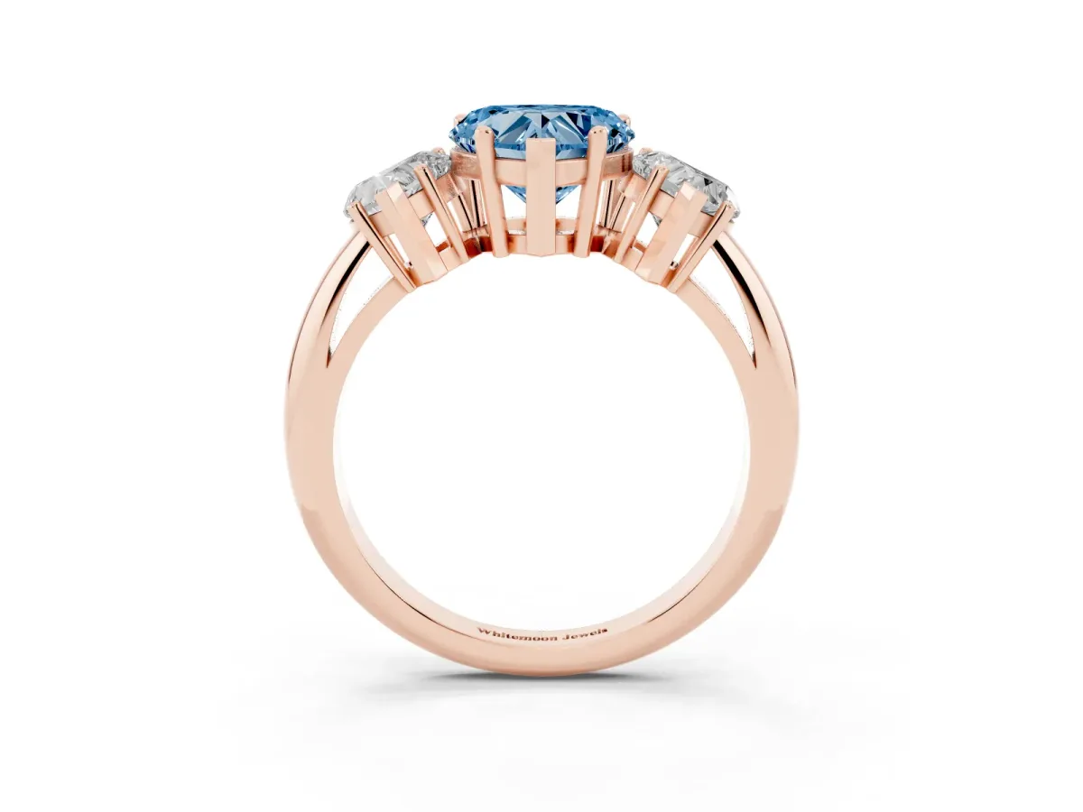 Fancy Blue Three-Stone Heart Cut Cut Diamond Engagement Ring with Prong Setting on a White Gold Band Rose gold