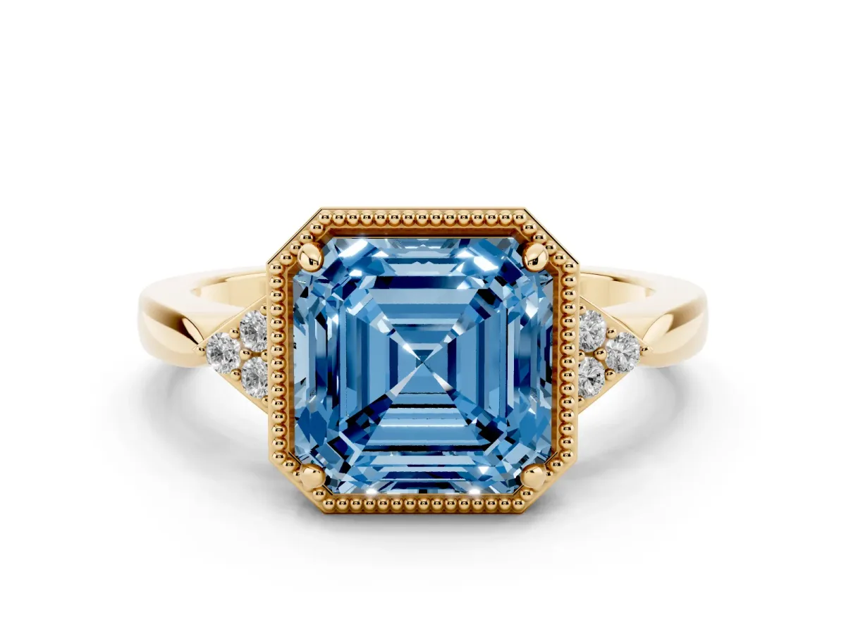 Fancy Blue Milgrain Asscher Cut Cut Diamond Ring with Tapered Pave Band and Four Prong Setting Yellow gold