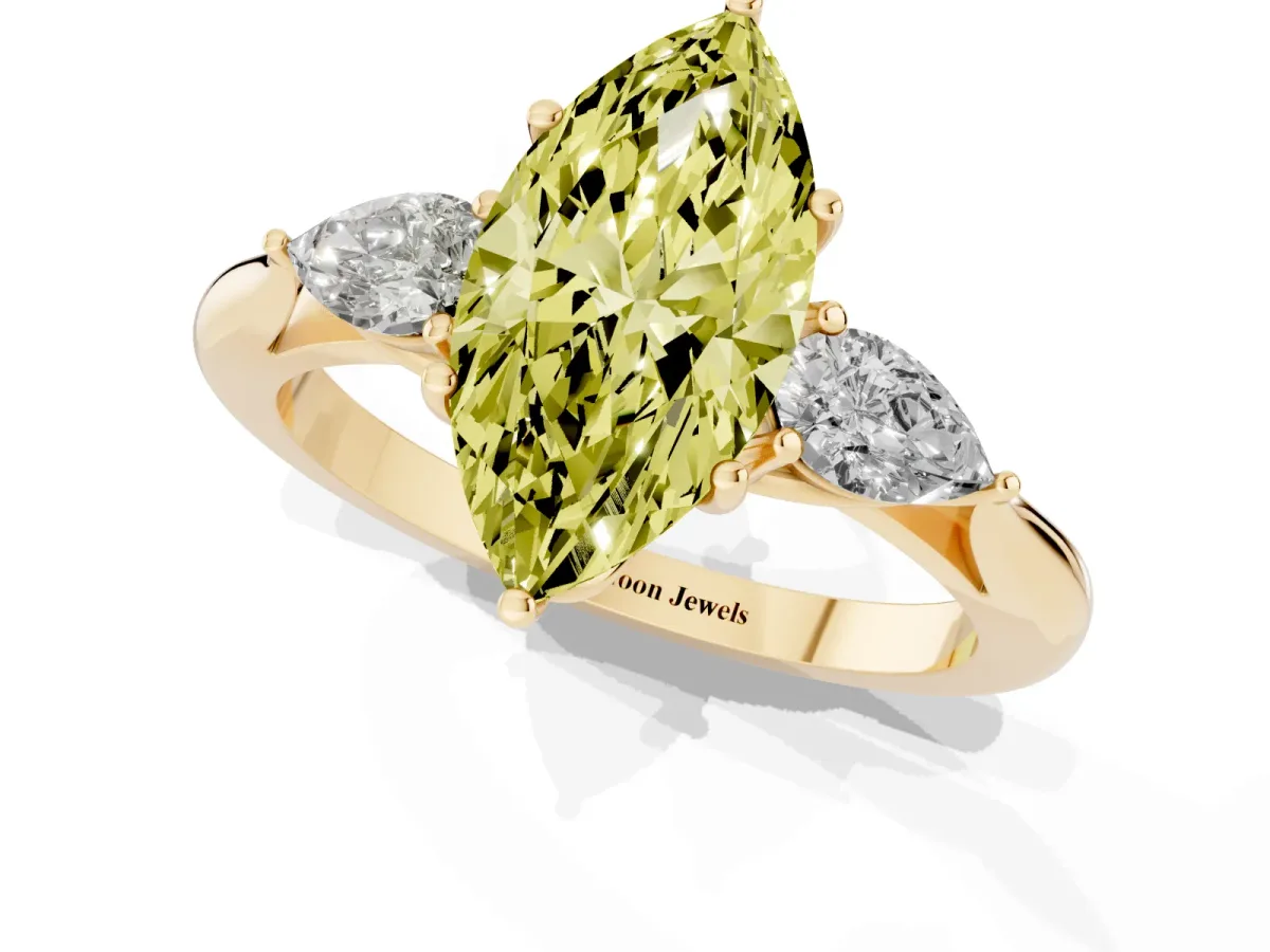 Fancy Yellow Three-Stone Marquise Cut Brilliant Diamond Solitaire Ring with Tapered Band and Four-Prong Setting Yellow gold