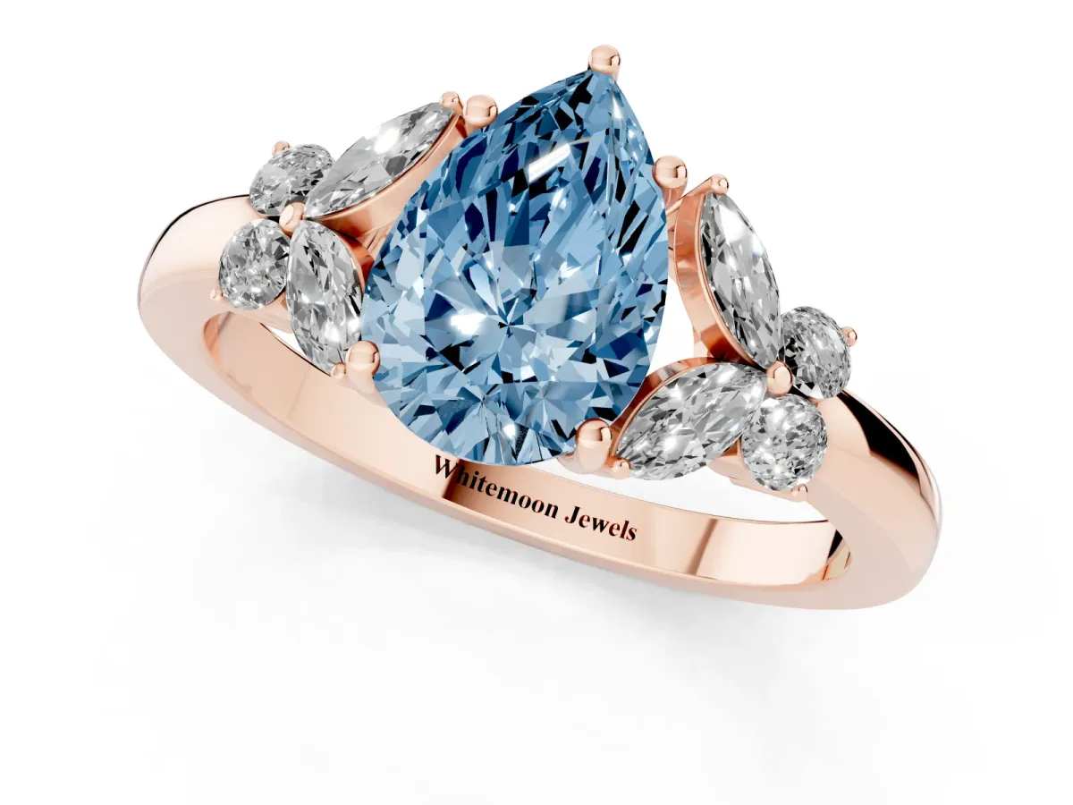 Fancy Blue Pear Cut Cut Solitaire Floral Diamond Ring with Four-Prong Setting Rose gold