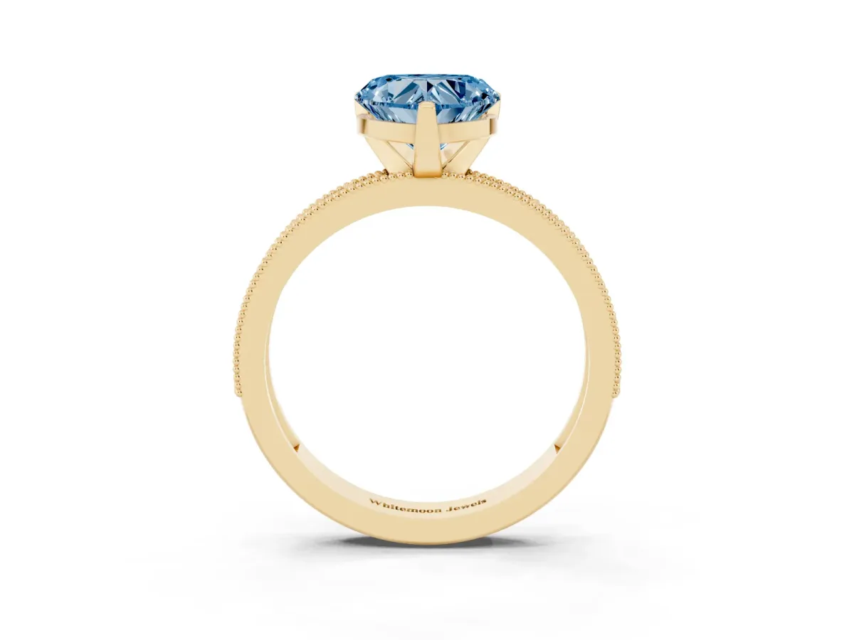 Fancy Blue Heart Cut Diamond Milgrain Pavé Engagement Ring with Four-Prong Setting Yellow gold