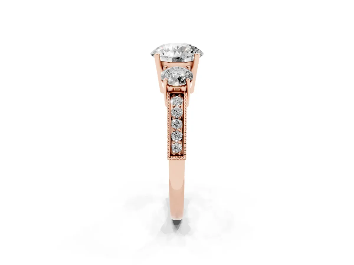 Round Cut Three-Stone Diamond Ring with Pavé Band and Four-Prong Setting Rose gold