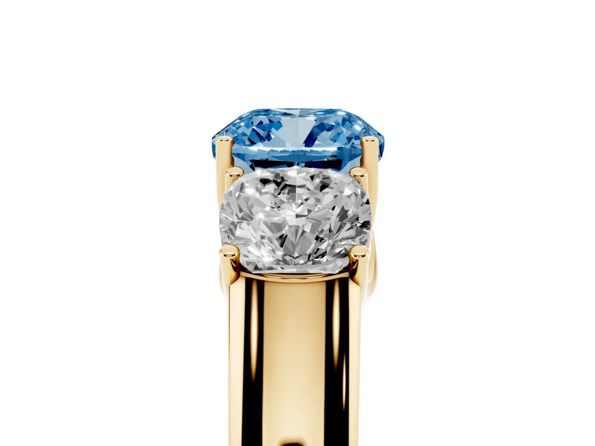 Fancy Blue Three-Stone Cushion Cut Cut Diamond Ring with Prong Setting and Classic Band Yellow gold