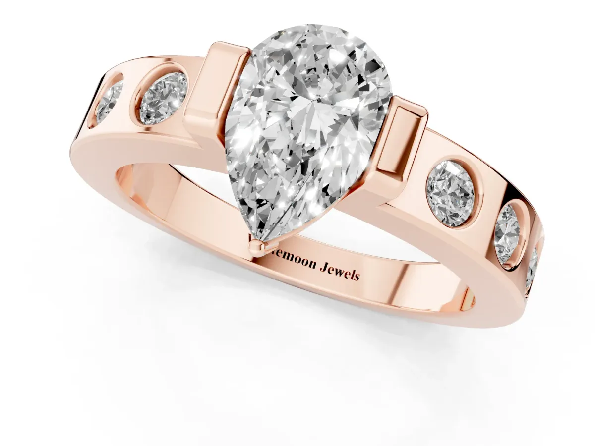 Pear Cut Brilliant Channel-Set Diamond Ring with Bezel Prong Setting Rose gold