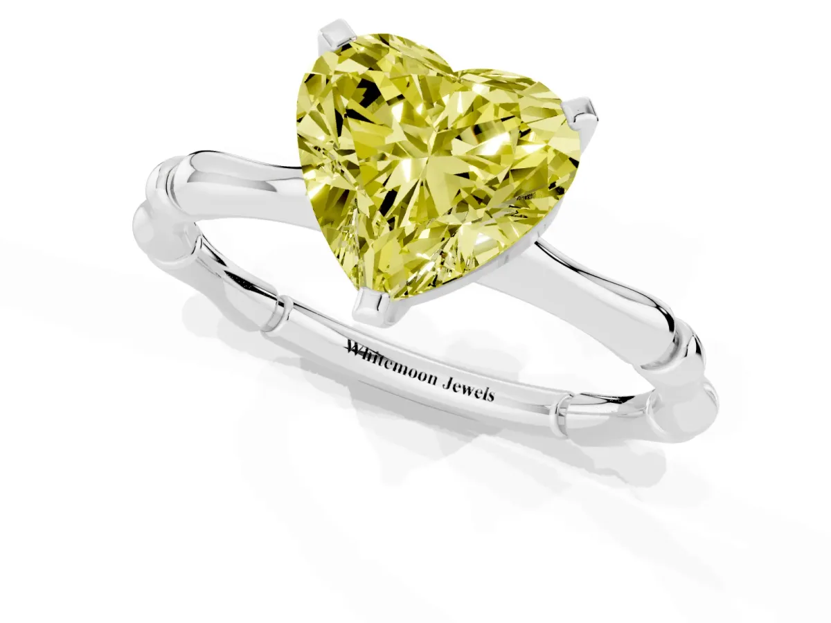 Fancy Yellow Heart Cut Solitaire Diamond Ring with Bamboo Band and Four-Prong Setting Silver