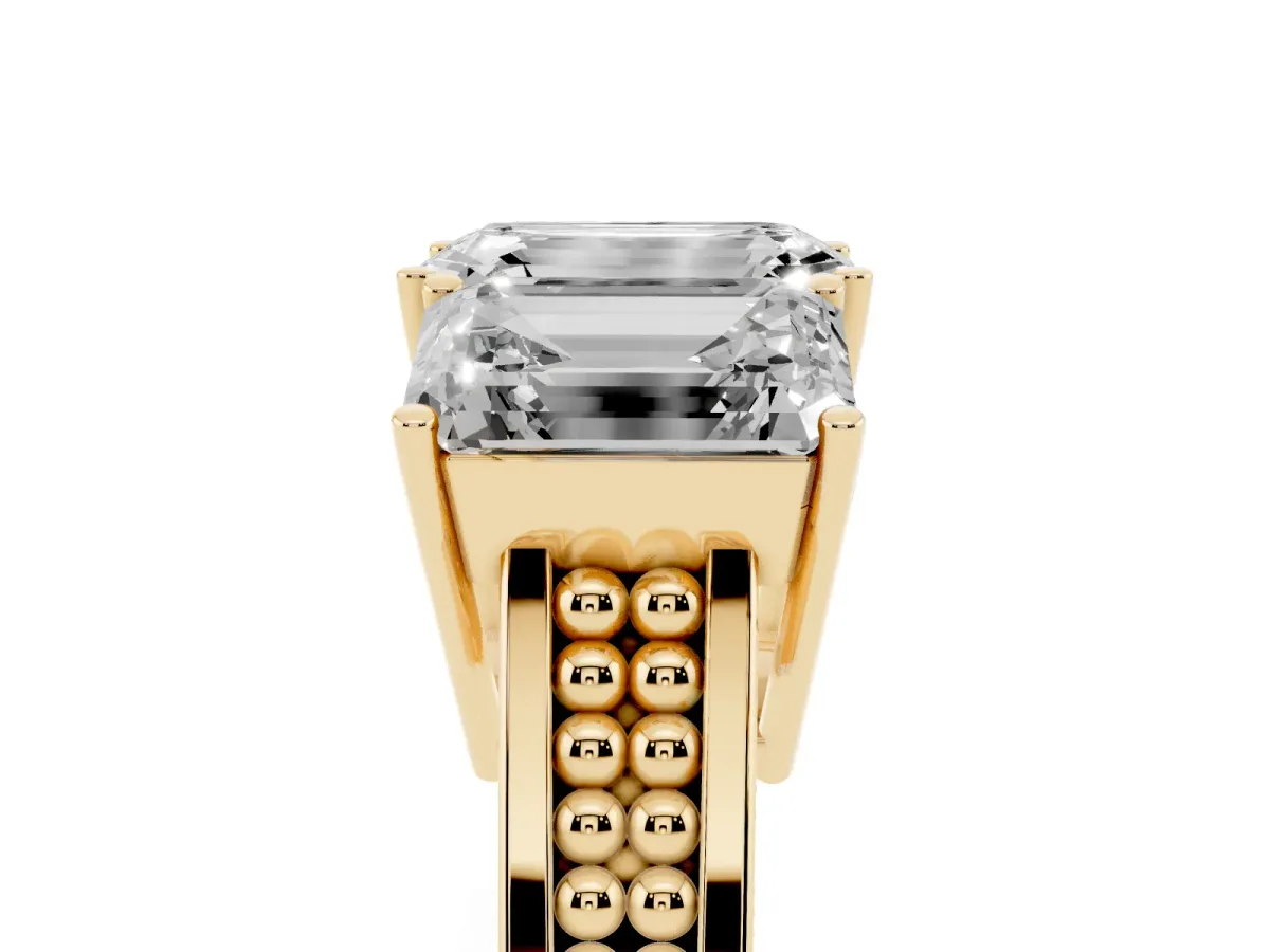 Emerald Cut Diamond Three-Stone Ring with Prong Setting and Textured Band Yellow gold