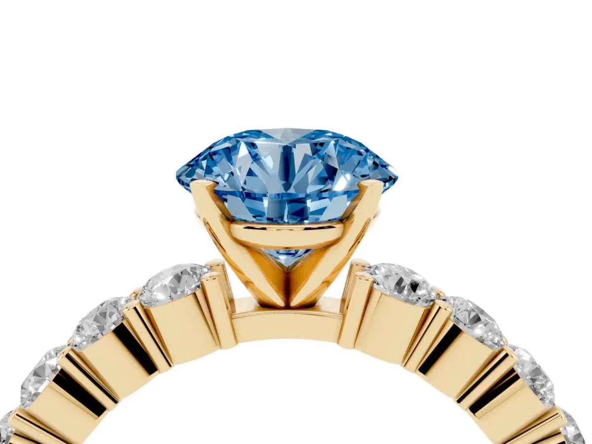 Fancy Blue Round Cut Diamond Solitaire Ring with Shared Prong Round Side Stones Yellow gold