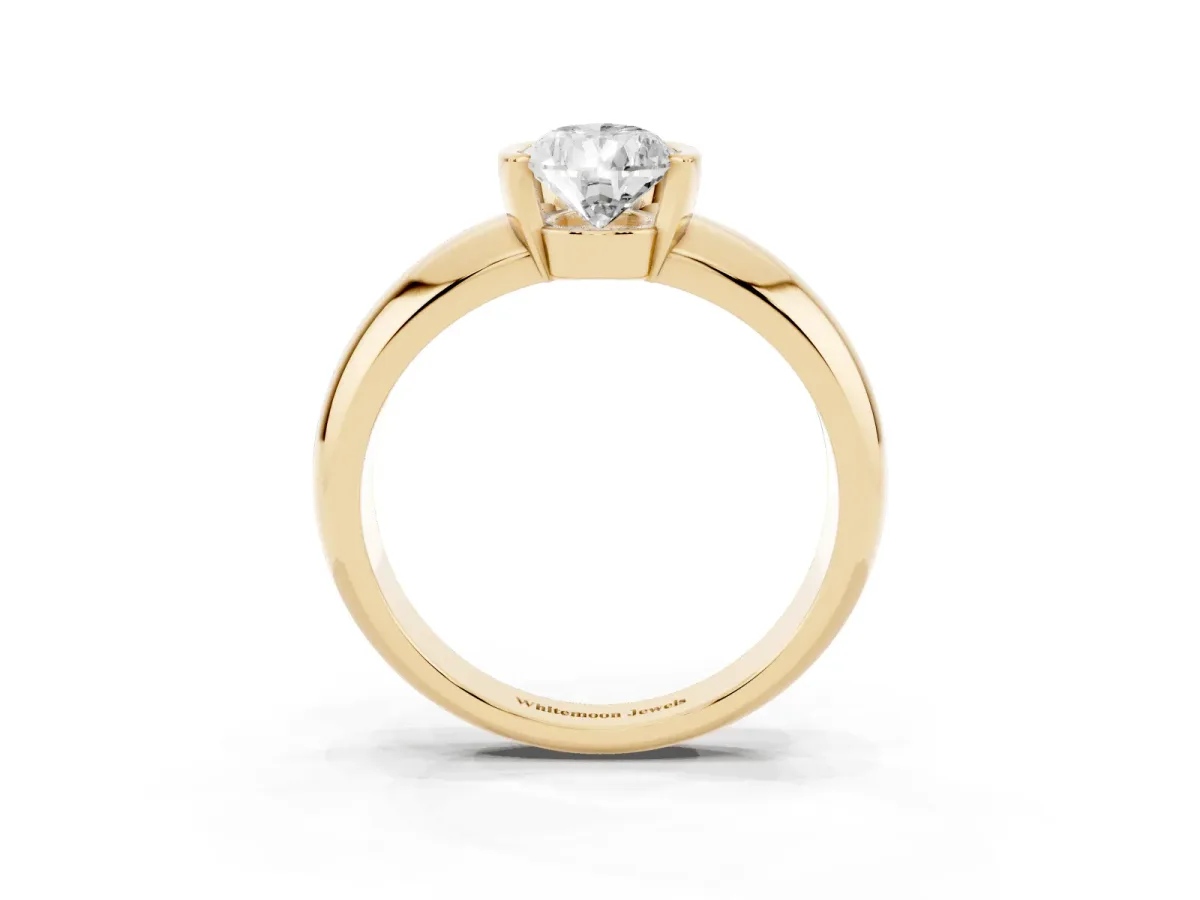 Pear Cut Solitaire Tension Set Diamond Ring with Wide Band Yellow gold