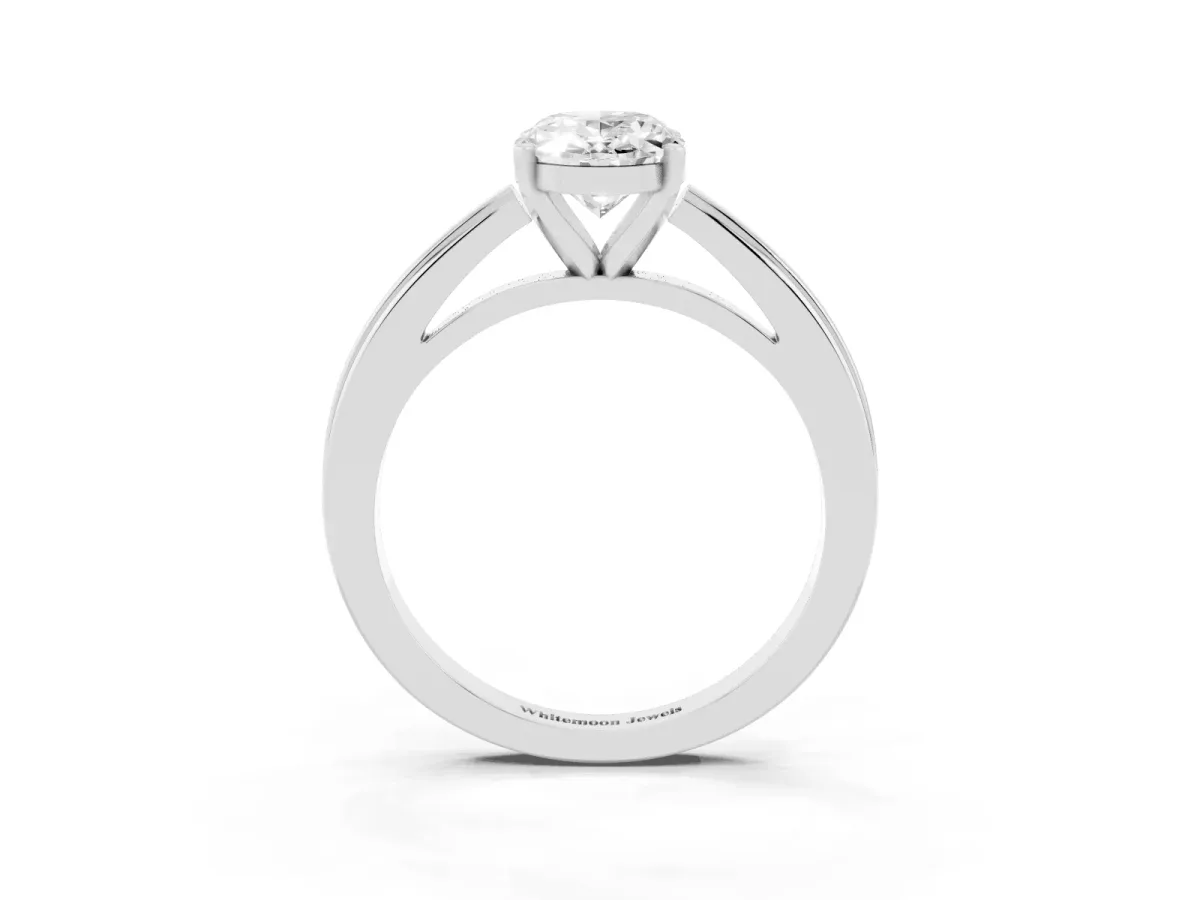 Oval Cut Solitaire Diamond Ring with Four-Prong Setting and Classic Band Silver