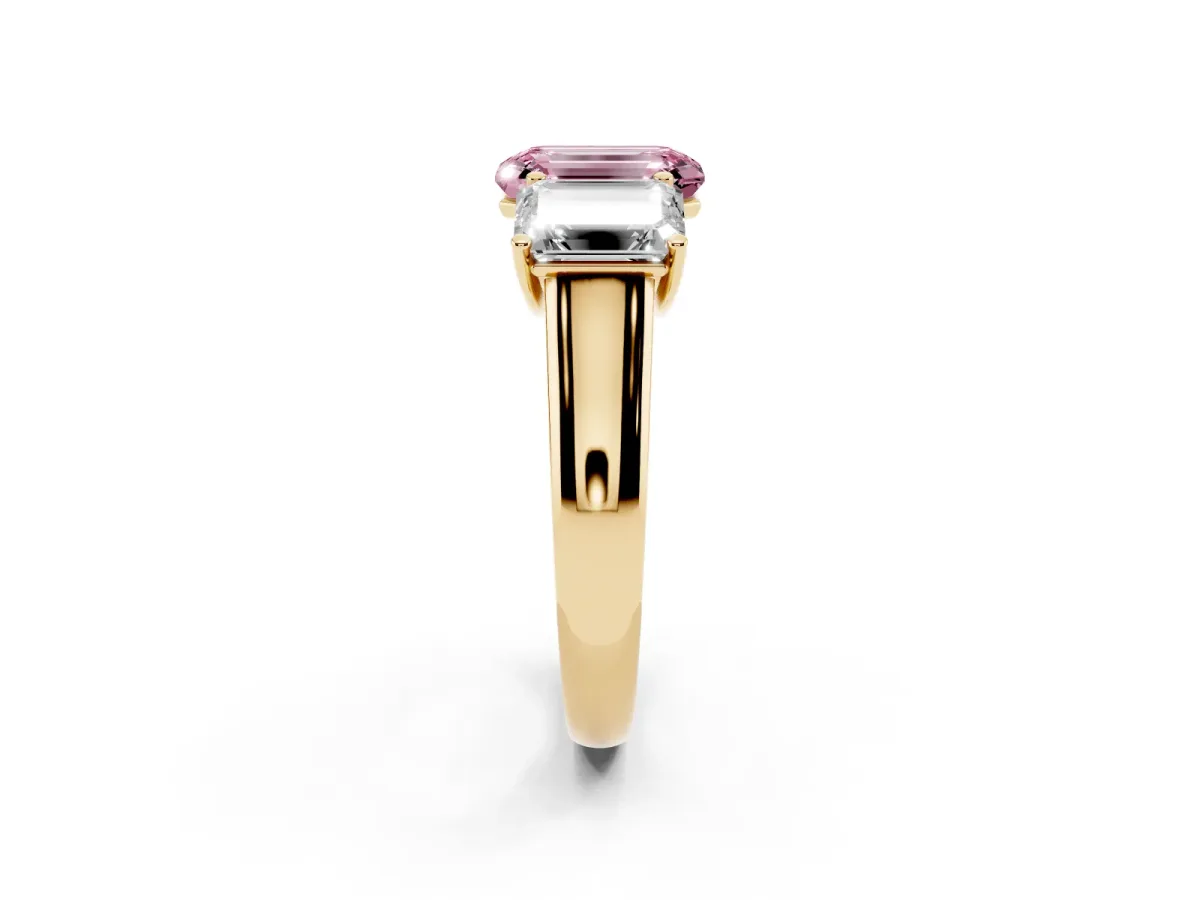 Fancy Pink Emerald Cut Three-Stone Diamond Ring with Prong Setting on a Classic Band Yellow gold