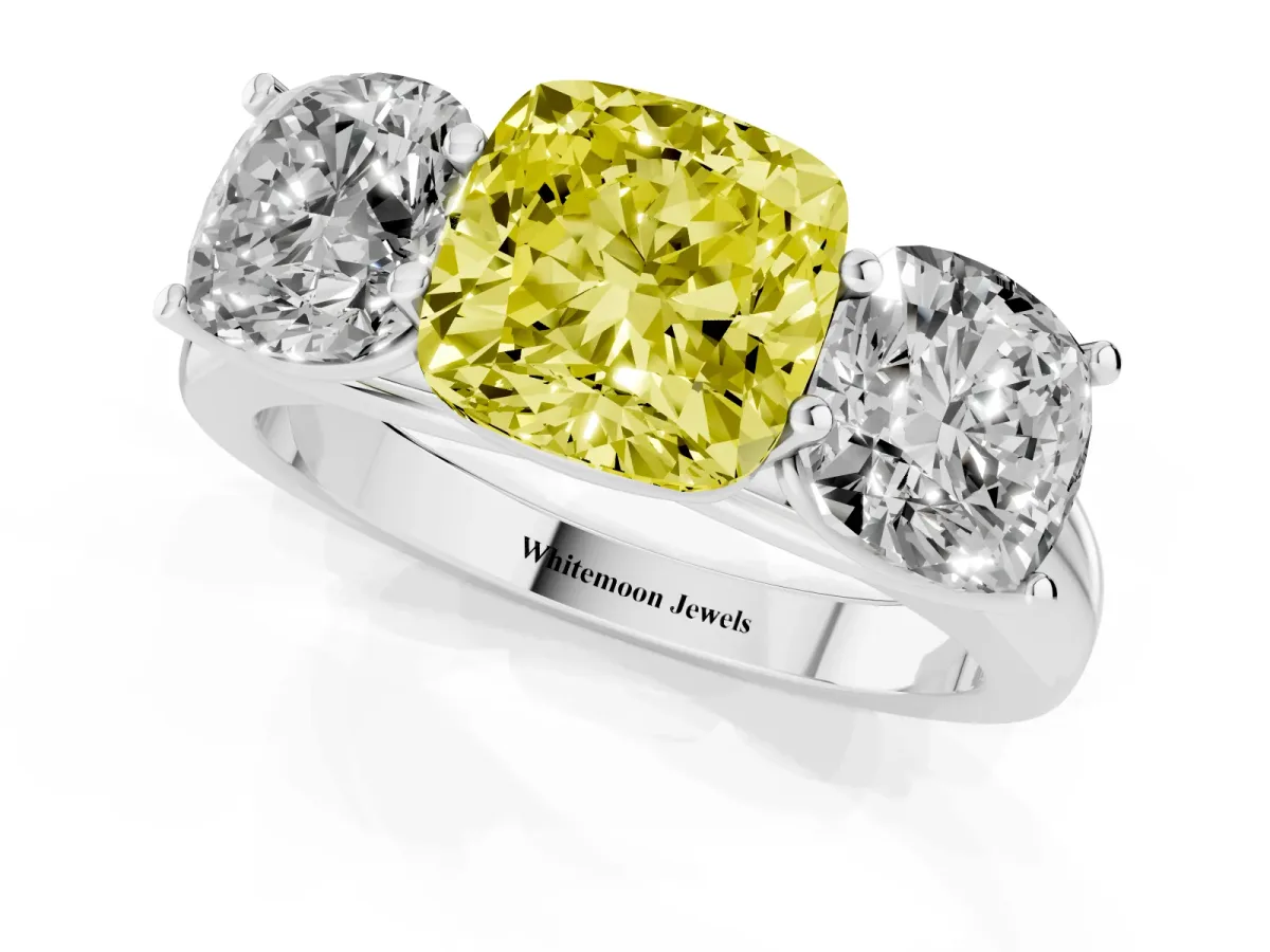 Fancy Yellow Cushion Cut Three-Stone Diamond Ring with Prong Setting on a Classic Band Platinum