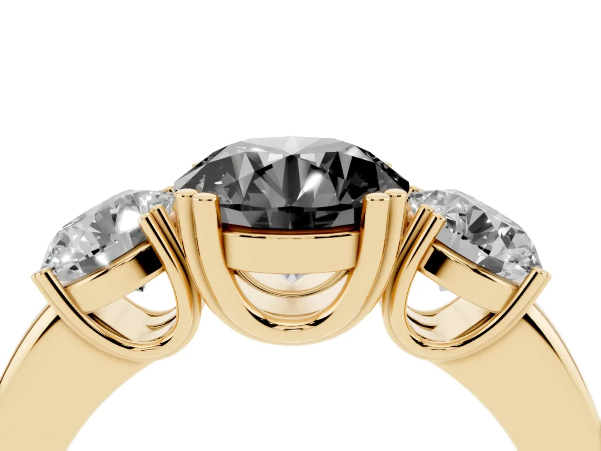 Fancy Black Three-Stone Round Cut Cut Diamond Ring with Channel Set Band and Four-Prong Setting Yellow gold