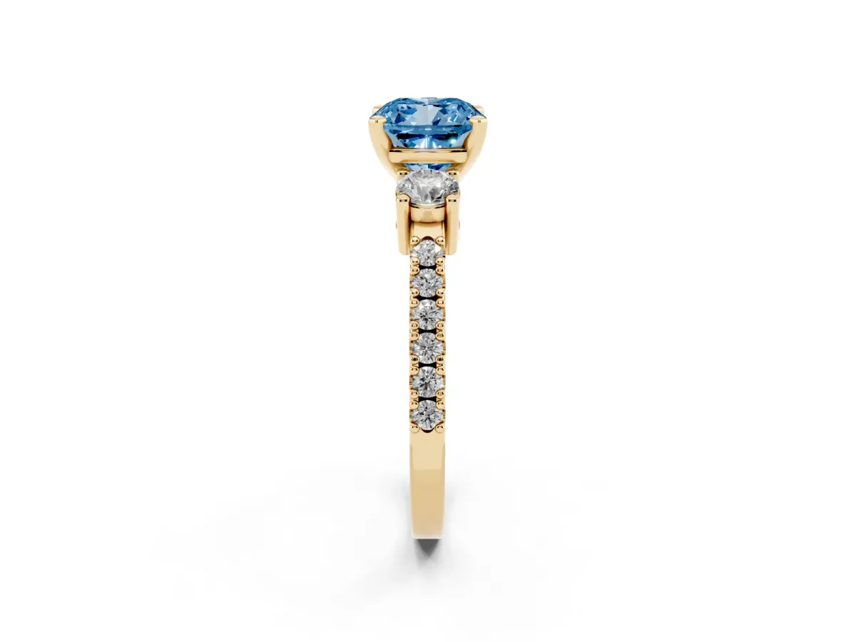 Fancy Blue Cushion Cut Three-Stone Diamond Pavé Band with Prong Setting Yellow gold