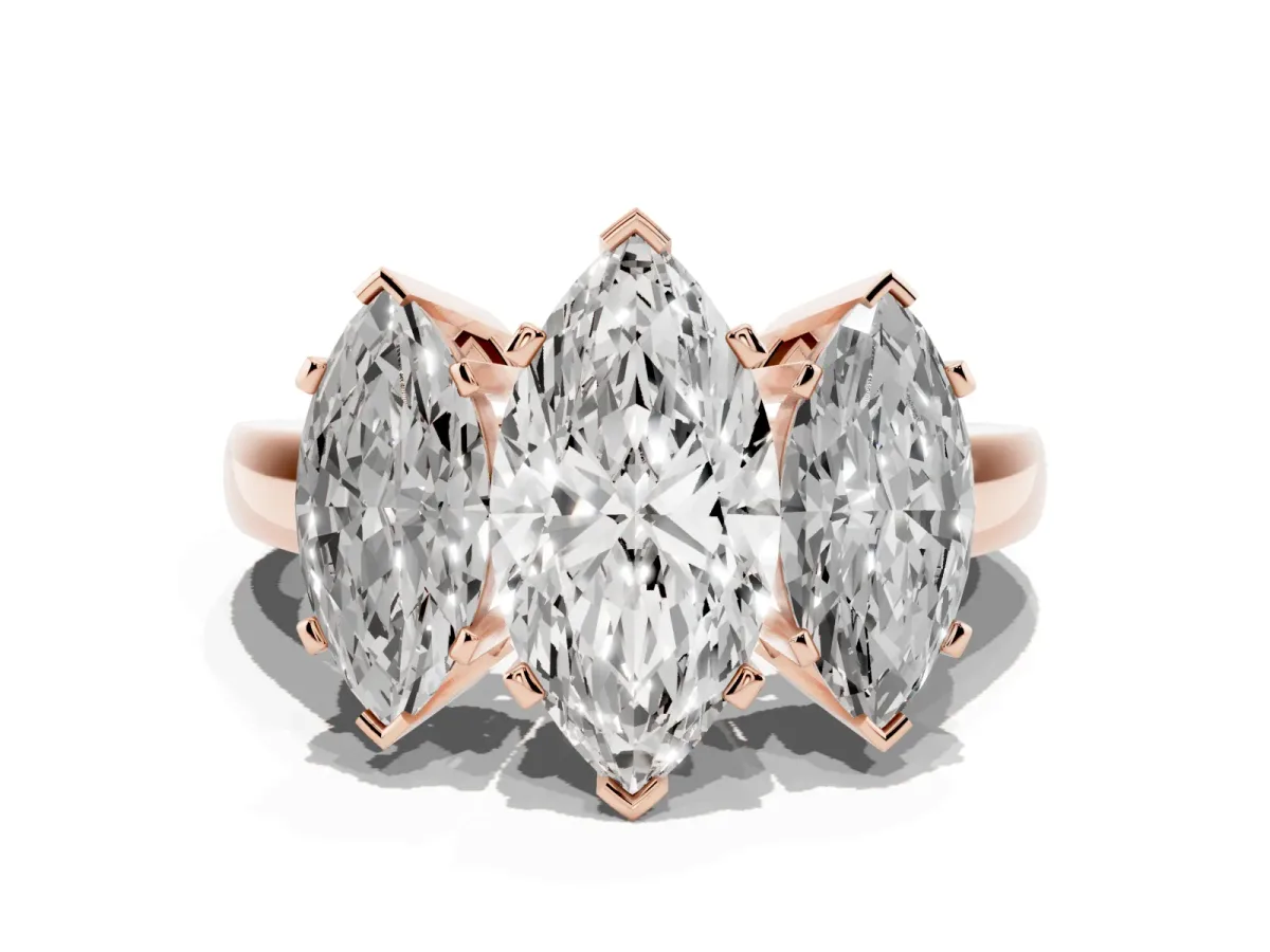 Three-Stone Marquise Cut Cut Diamond Ring with Channel Set Band and Four-Prong Setting Rose gold