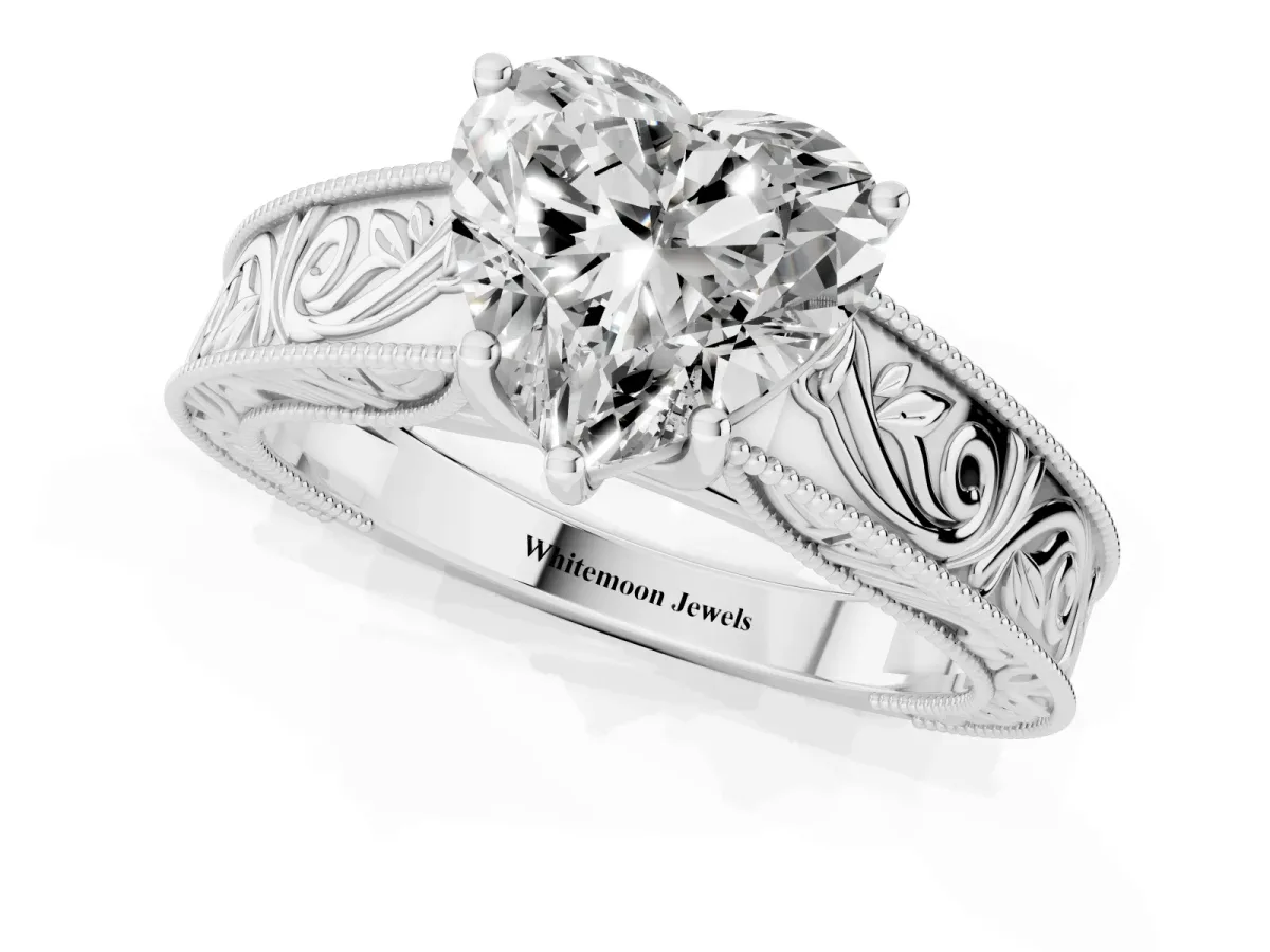 Heart Cut Diamond Solitaire Ring with Engraved Band and Four-Prong Setting White gold