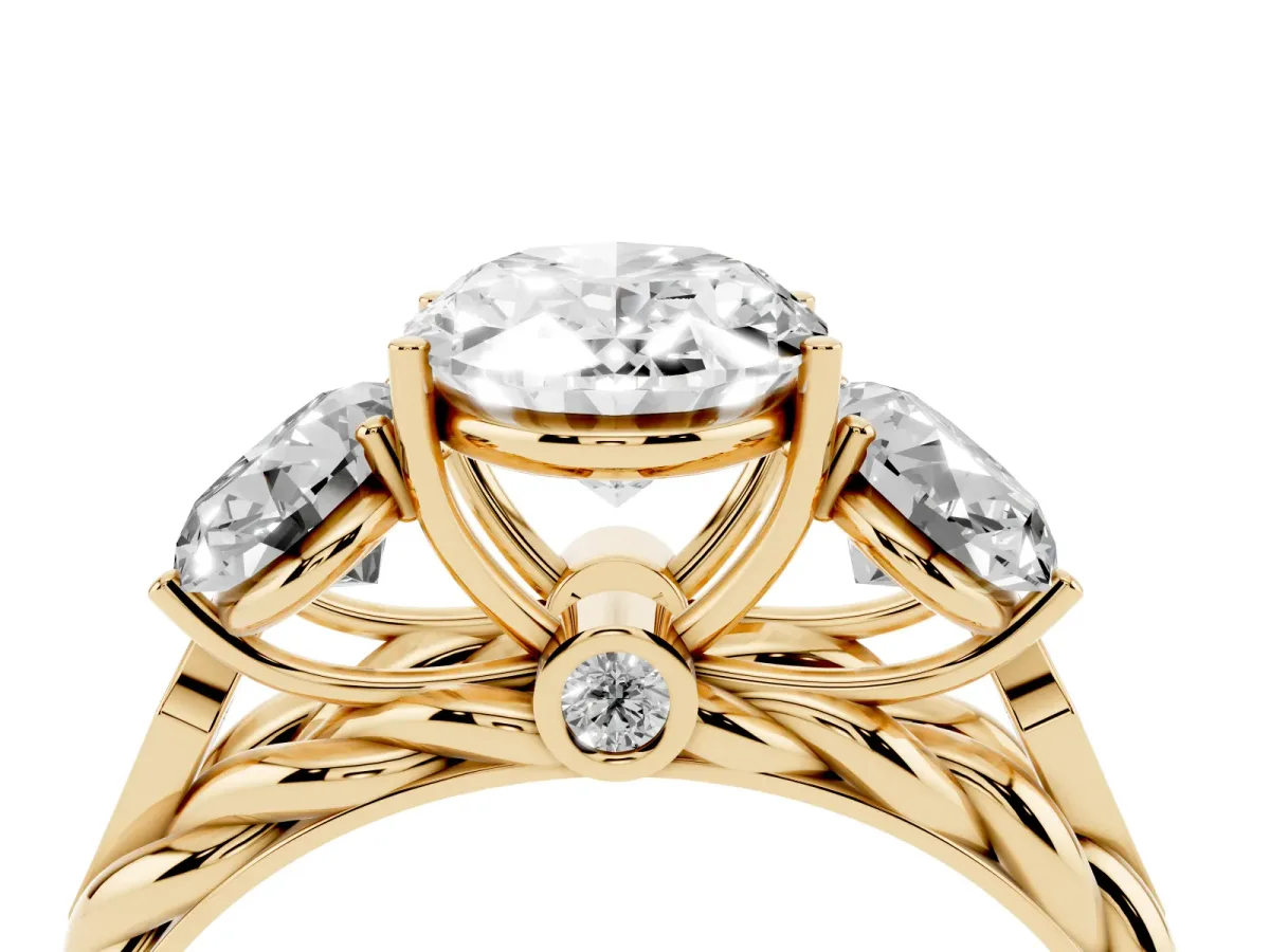 Three-Stone Oval Cut Diamond Braided Band Ring with Four-Prong Setting Yellow gold